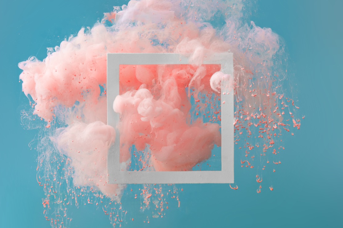 white picture frame on blue background with pink smoke as the art